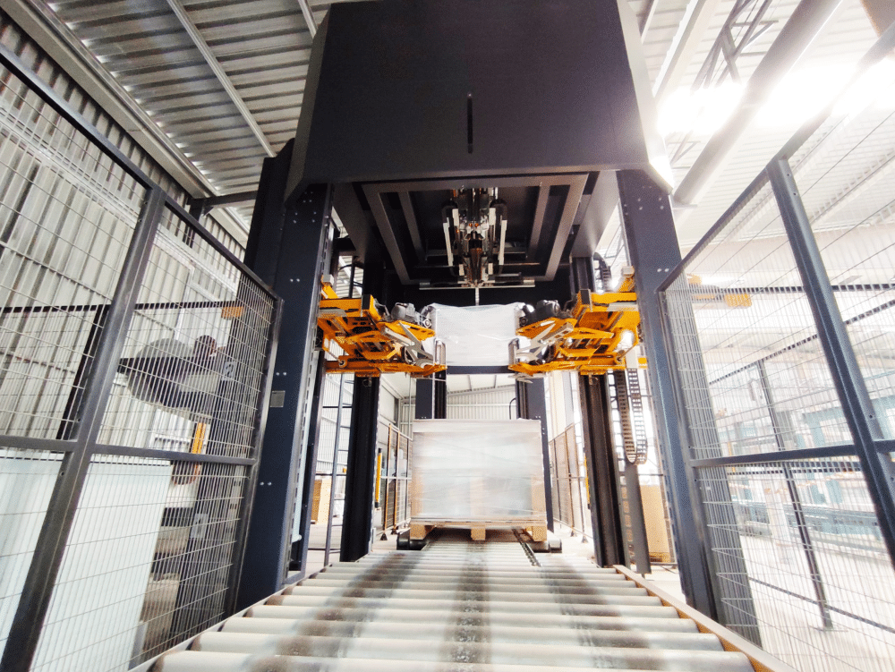 Pallet of goods getting wrapped by a stretch hooder