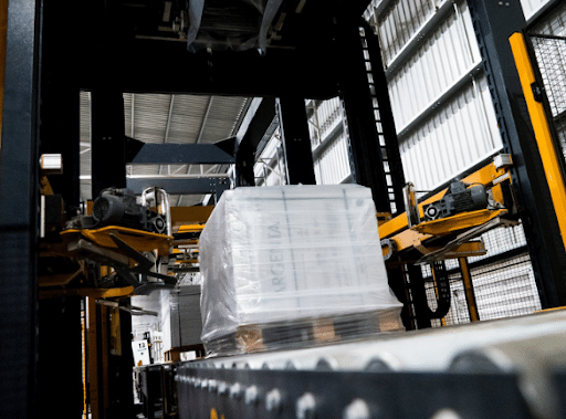 Pallet of goods with stretch hooder film around it